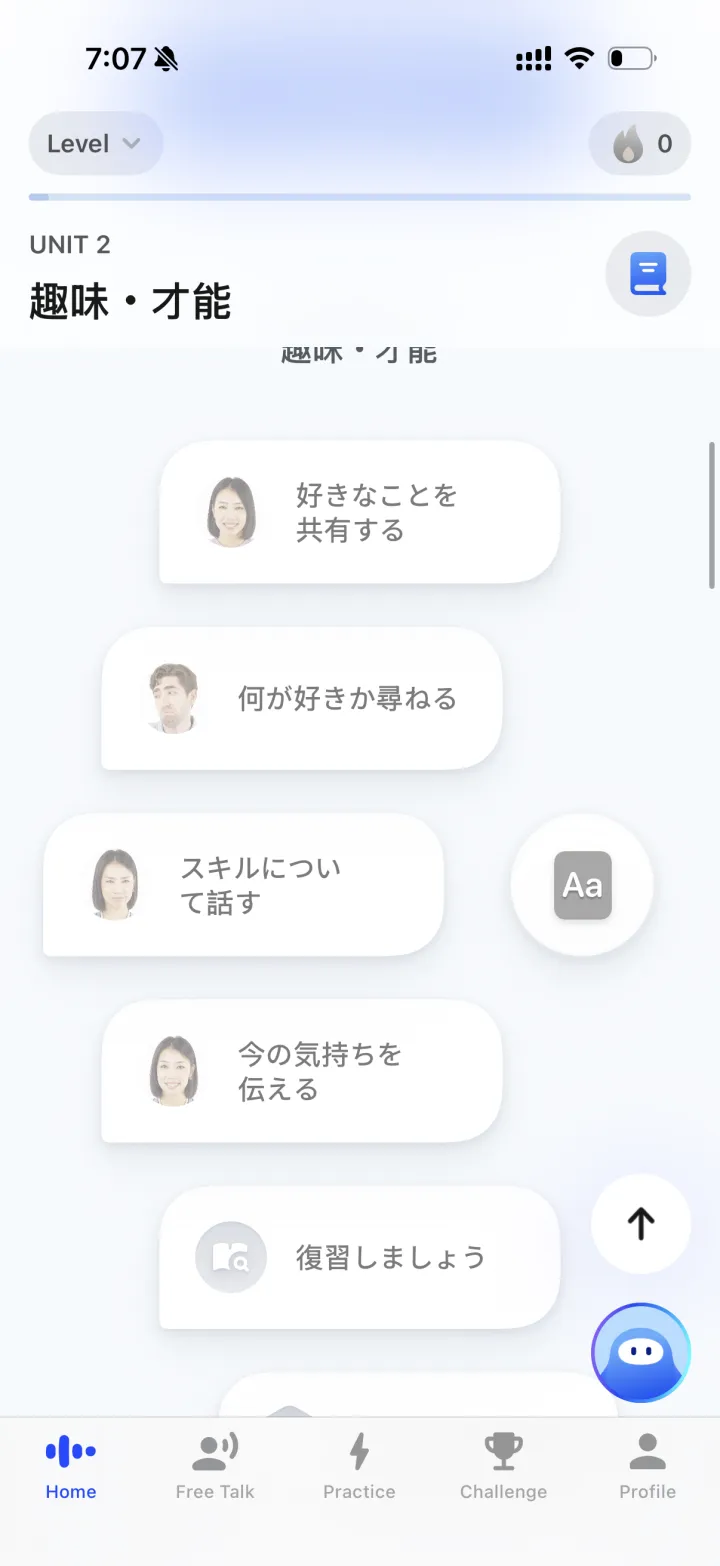 Speak app showing Unit 2 of a Japanese course — a list of conversation lessons such as sharing what you like and talking about skills — with a Free Talk tab in the navigation